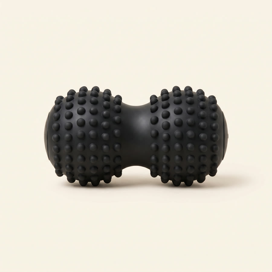 Rouleau d'acupression noir à picots pour le muscle piriforme