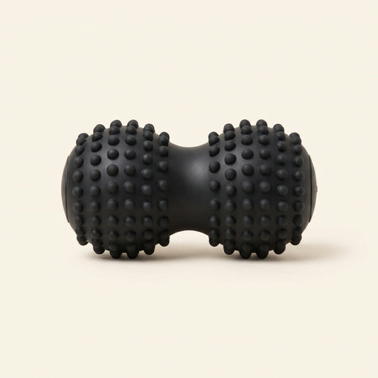 Rouleau d'acupression noir à picots pour le muscle piriforme